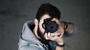 Photographerin Action.jpg Wallpaper
