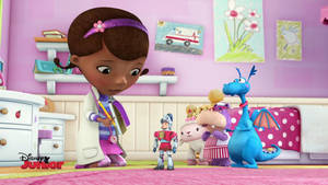 Picture Of Doc Mcstuffins With Sir Kirby In An Animated Scene Wallpaper