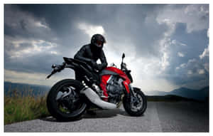 Picture Perfect Ride: Rev Up Your Soul With This Amazing Motorcycle And Enjoy The Ride Of A Lifetime. Wallpaper