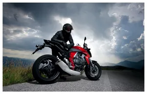 Picture Perfect Ride: Rev Up Your Soul With This Amazing Motorcycle And Enjoy The Ride Of A Lifetime. Wallpaper