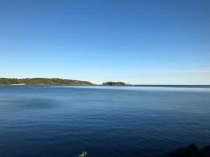 Picturesque Sunrise Over Karlshamn Port Wallpaper