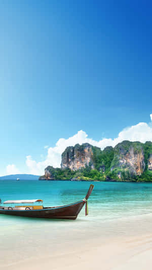 Picturesque Twilight At A Thailand Beach Wallpaper