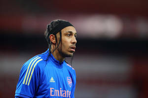 Pierre-emerick Aubameyang Blue Arsenal Jersey Wallpaper