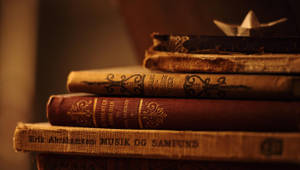 Pile Of Classic Literature Books Wallpaper