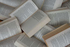 Pileof Open Books Wallpaper