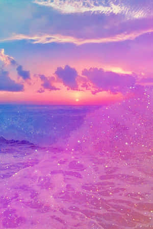 Pink Beach Sunset With Shimmering Waves Wallpaper