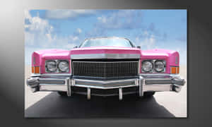 Pink Cadillac Cruising Down The Street Wallpaper