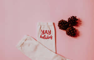 Pink_ Christmas_ Sock_and_ Pinecones Wallpaper