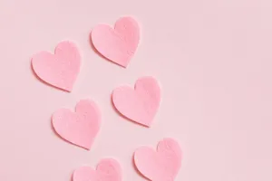 Pink Felt Hearts Background Wallpaper