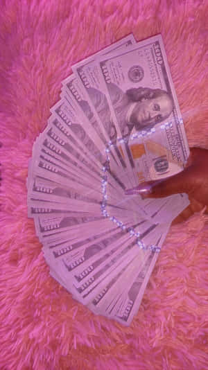 Pink Fur Backgroundwith Fanned Money Wallpaper