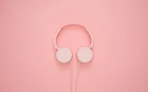 Pink Headphones On A Pink Background Wallpaper