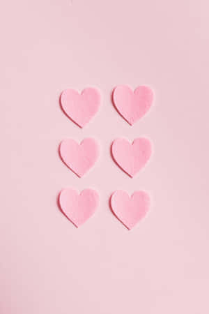 Pink Heart Shape On Pink Background Wallpaper