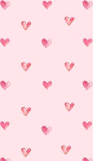 Pink Hearts On A Pink Background Wallpaper