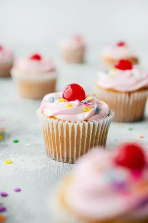 Pink Icing With Cherry Cupcake Wallpaper