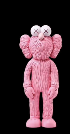 Pink K A W S Figure Black Background Wallpaper
