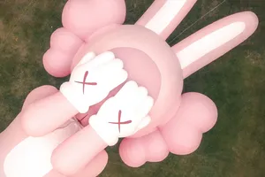 Pink K A W S Sculpture Aerial View Wallpaper