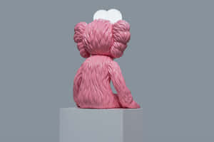 Pink Kaws Figure Back View Wallpaper
