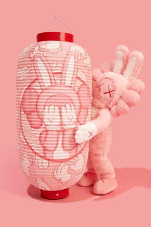 Pink Kaws Figureand Lantern Wallpaper