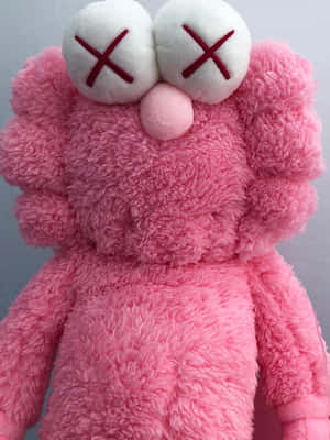 Pink Kaws Plush Toy Wallpaper