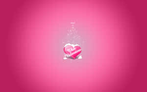 Pink Love: A Beautiful Heart Illuminated In A Romantic Glow Wallpaper