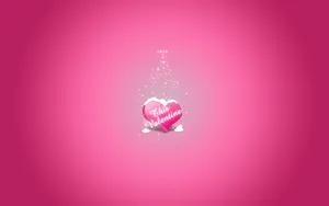Pink Love: A Beautiful Heart Illuminated In A Romantic Glow Wallpaper