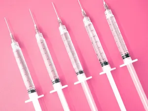 Pink Medical Syringes Aesthetic Wallpaper