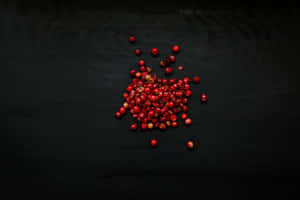 Pink Peppercorn Cluster On Branch Wallpaper