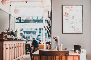 Pink Rose On Coffee Shop Table Wallpaper