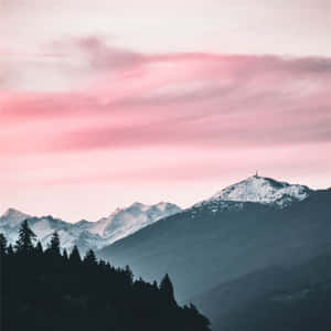 Pink_ Sunset_ Over_ Snowy_ Mountain_ Peaks Wallpaper