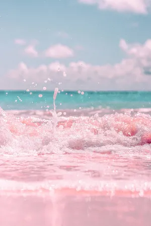 Pink Water Splashing On The Beach Wallpaper