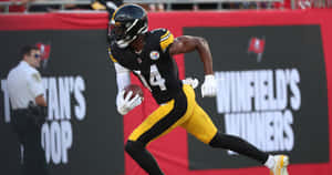 Pittsburgh Steelers Player Running With Football Wallpaper
