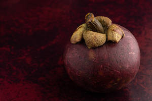 Pixelated Mangosteen Tropical Fruit Wallpaper