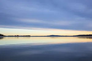 Placid Lake On A Sunrise Wallpaper