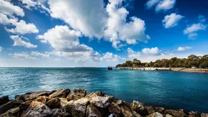 Placid Sky Above The Ocean Wallpaper