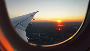 Plane Wing During Sunset Wallpaper