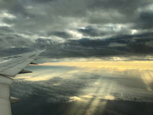 Plane Wing In Sunshine Sky Wallpaper