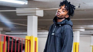 Playboi Carti On A Parking Lot Wallpaper