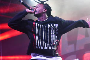 Playboi Carti Pfp On Stage Wallpaper