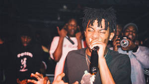 Playboi Carti Rapping In Studio Wallpaper