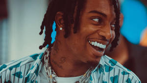 Playboi Carti Smiling Widely Wallpaper