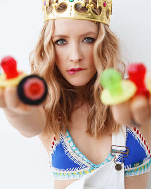 Playful Crownand Water Gun Portrait Wallpaper