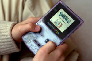 Playing Pokemon Gameboy Color.jpg Wallpaper