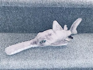 Plush Sawfish On Couch.jpg Wallpaper