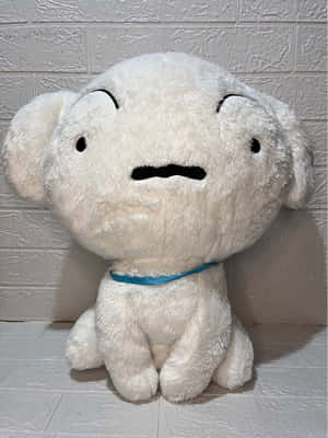 Plush White Dog Toy Sitting Wallpaper