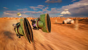 Podracers Competing In A Thrilling Race Wallpaper