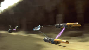 Podracers Speeding Through A Desert Course Wallpaper