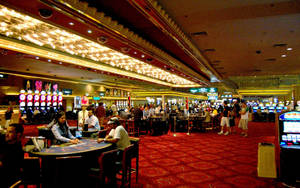 Poker Table On Red Carpet Wallpaper