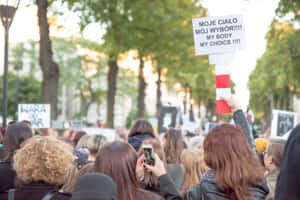 Polish Protesters Displaying Pro-abortion Placards Wallpaper