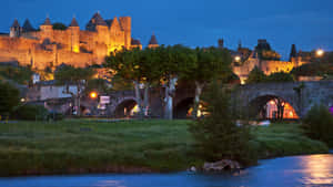 Pont Vieux In Carcassonne France During Nighttime Wallpaper