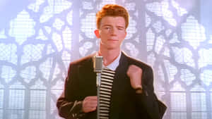 Pop Star Rick Astley In Concert Wallpaper